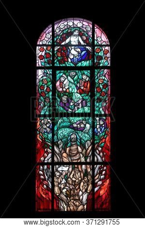 HOHENBERG, GERMANY - MAY 06, 2014: Jesus' Genealogy, stained glass window by Sieger Koder in St. James church in Hohenberg, Germany