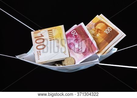 Medical Face Masks And Money Background. World Coronavirus Epidemic And Economic Losses Concept. Con