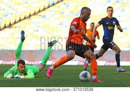 Kyiv, Ukraine - June 6, 2020: Marlos Of Shakhtar Donetsk (in Orange) Attacks During The Ukrainian Pr