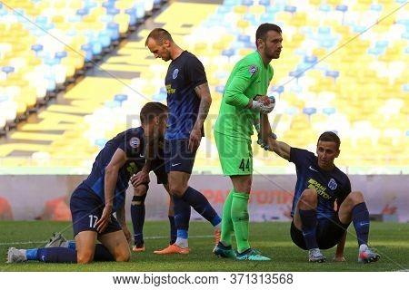 Kyiv, Ukraine - June 6, 2020: Goalkeeper Yevhen Past And Players Of Desna Chernihiv Reacts During Th