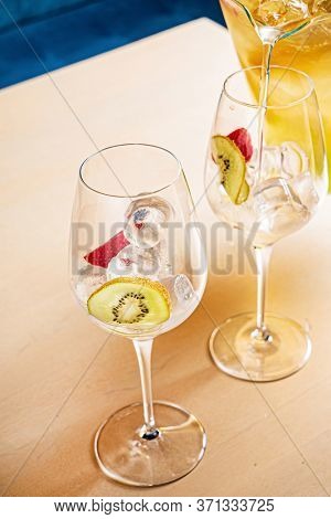 summr lemonade with kiwi fruits and strawberries