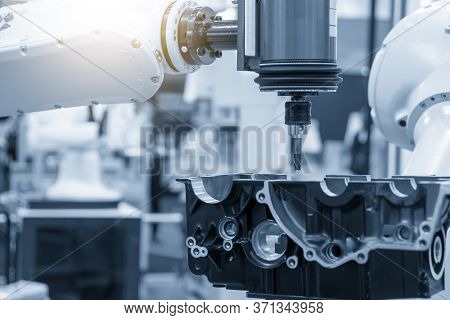 The Milling Spindle Attached With The Robotics Arm  Finishing Cut  The Aluminium Transmission Parts 