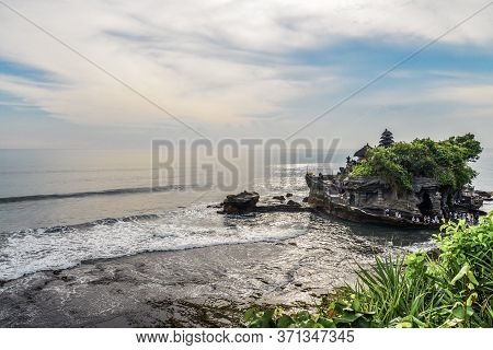 The Tanah Lot Temple, The Most Important Indu Temple Of Bali, Indonesia Befor Sunset