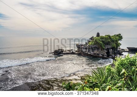 The Tanah Lot Temple, The Most Important Indu Temple Of Bali, Indonesia Befor Sunset