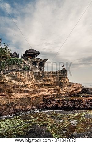Tanah Lot Temple, The Most Important Indu Temple Of Bali, Indonesia Befor Sunset