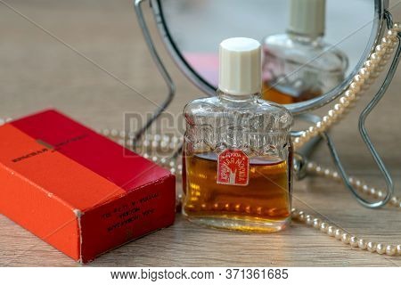Kyiv, Ukraine - June 13, 2020. A Half-empty Bottle Of Vintage Soviet Perfume Krasnaya Moskva - Red M