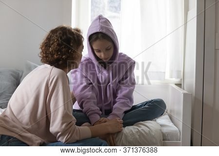 Caring Mom Talk With Sad Teenage Daughter Suffering At Home