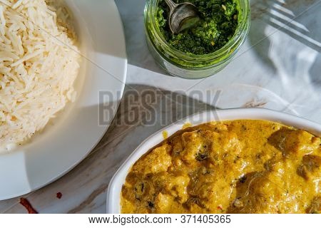 Authentic Indian Almond Chicken Korma Curry Dinner With Basmati Rice And Green Chutney