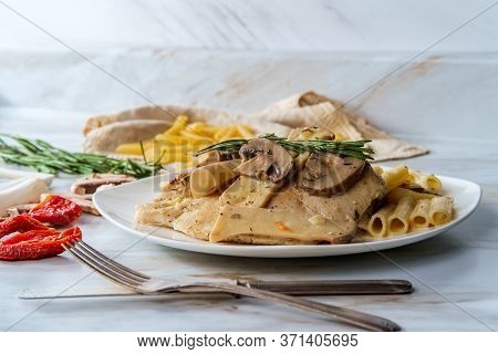 Creamy Italian Chicken Marsala With King Oyster Mushrooms And Sundried Tomatoes Served Over Penne Ri
