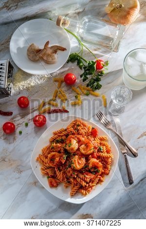 Gluten-free Fusilli Pasta In Creamy Vodka Tomato Sauce With Sausage Shrimp And Green Peas