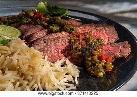 Rib-eye Steak Cooked Rare With Hot And Spicy Thai Crying Tiger Sauce Also Called Suea Rong Hai