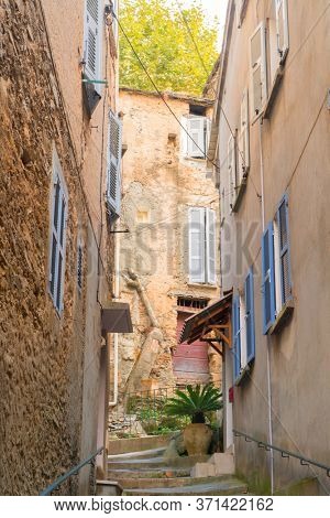 Looking through Little lane French village Casinca