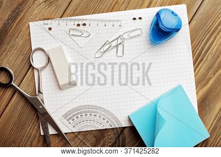 school supplies on wooden background. back to school