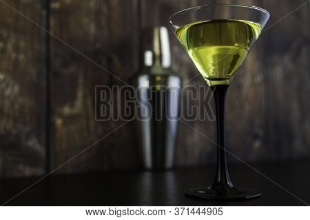 Yellow Cocktail Glass And Cocktail Shaker