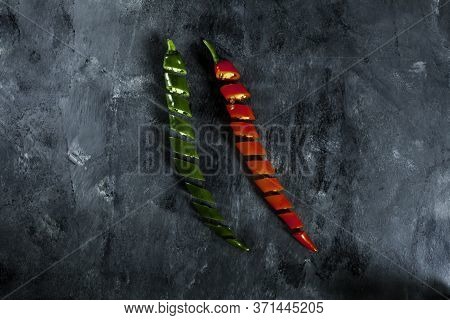 Fresh Spicy Green And Red Peppers Sliced