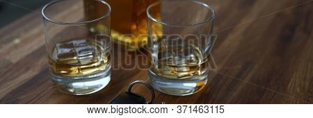 Car Key Lies On Table Next To Bottle Alcohol. Permissible Rate Alcohol While Driving. Drivers Are Te