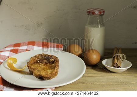 Typical Spanish Torrijas With Ingredients