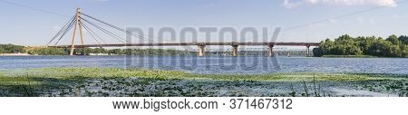 Modern Road Cable-stayed Bridge Over River, Wide Panoramic View. Pivnichnyi (former Moskovskyi) Brid