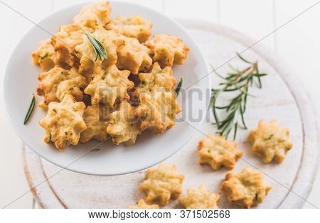Parmesan cookies with rosemary. Salty cheese cookies. Healthy snack.