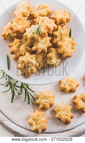 Parmesan cookies with rosemary. Salty cheese cookies. Healthy snack.