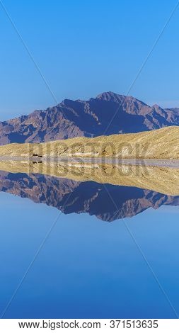 Vertical Crop Landscape With Reflections At Bonnievale Salt Flat