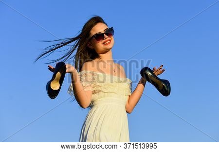Woman On Sunny Morning Blue Sky. Summer Holidays. Model Tender Summer Dress. Freedom. Girl In Sungla