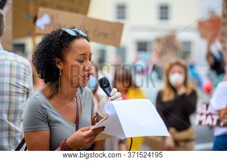 Richmond, North Yorkshire, Uk - June 14, 2020: A Female Speaker At A Black Lives Matter Protest In R