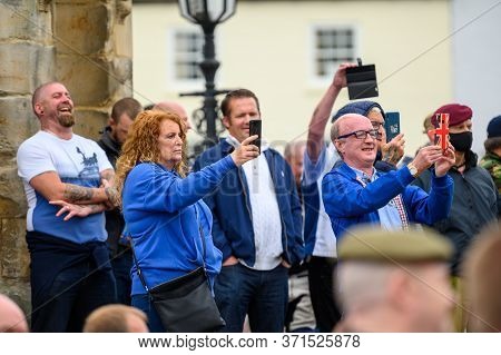 Richmond, North Yorkshire, Uk - June 14, 2020: Counter Protesters Use Smartphones To Video A Black L