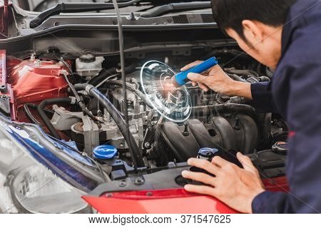 Asian Man Mechanic Inspection Shine A Torch Car Engine Checking Bug In Engine From Application Smart