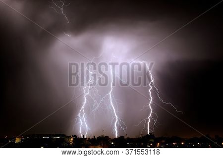 Lightning Strikes At Night During A Severe Thunderstorm Over The City Of Mendoza, Argentina