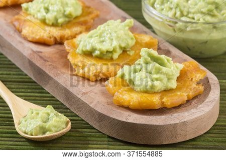 Patacón Fried Flattened Pieces Of Green Plantain (tostón, Tachino)