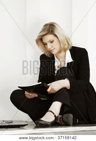 Young businesswoman with a floder