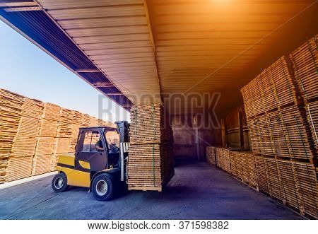 Forklift Loader Load Lumber Into A Dry Kiln. Wood Drying In Containers.