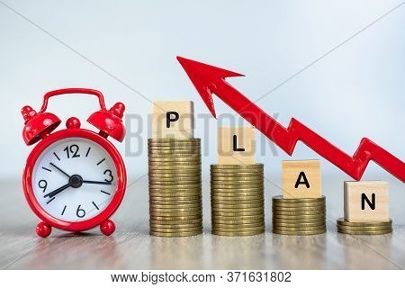 Red Alarm Clock Coin Ladder. Red Arrow. Time Planning Concepts. Financial Accounting. Tax Time Notif