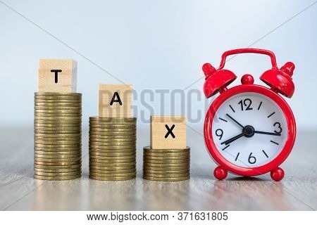 Tax. Coin Ladder. Red Alarm Clock. Concept Of Time And Tax Financial Wealth, Accounting, Tax Time No