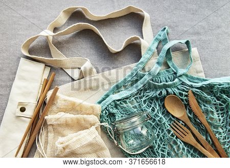 Cotton Bags, Net Bag With Reusable  Glass Jars And Bamboo Cutlery. Zero Waste Concept. Eco Friendly.