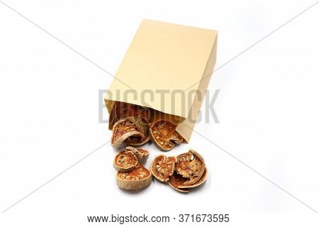 Dry Bale Fruit. Healthy Drinking Of Organic Fruit. Bale Fruit In Paper Bag Isolated On White Backgro