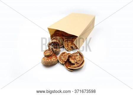Dry Bale Fruit. Healthy Drinking Of Organic Fruit. Bale Fruit In Paper Bag Isolated On White Backgro