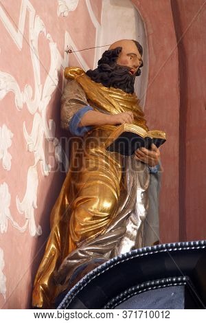ZAGREB, CROATIA - MAY 16, 2013: Saint Mark the Evangelist, statue on the altar of the Holy Spirit in the Church of Saint Catherine of Alexandria in Zagreb, Croatia
