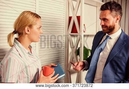 Love Affair At Work. Business Couple. Handsome Man Speak To Cute Woman In Office. Office Life. Boss 