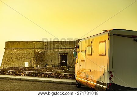 Caravan Visitng Coastal Fortification, Castle Near The Town Of Los Banos De Guardias Viejas, Almer