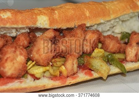 Chicken With Fries And Tomato In A Sandwich