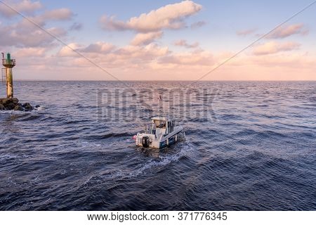 Hossegor, France. 17.05.2020. Sea Boat In The Morning Going To Fishing. High Quality Photo