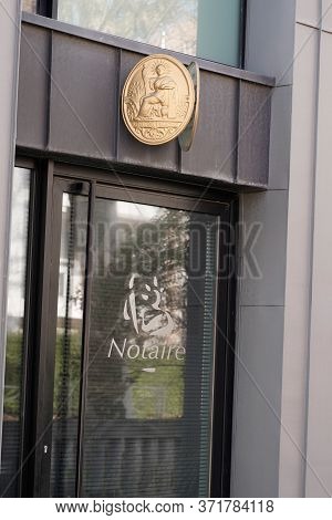 Bordeaux , Aquitaine / France - 06 06 2020 : Golden Plate Notary In Wall Building Office For French 