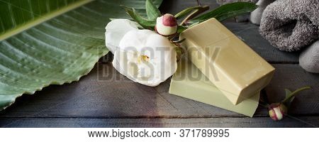 Natural Olive Soaps With Bath Accessories In A Modern Setting For A Wellness Concept. Gray Wooden Ho