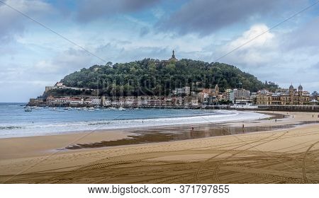 San Sebastian, Spain. Sept 11, 2017. La Concha Beach With View On Of The Mount Urgul - On Top Of It 