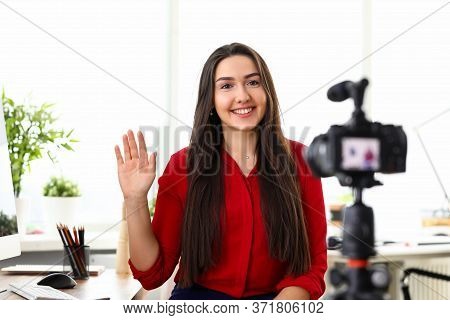 Girl Sitting In Front Camera Smiles Takes Off Blog. Girl Artist Welcomes To Camera His Subscribers. 