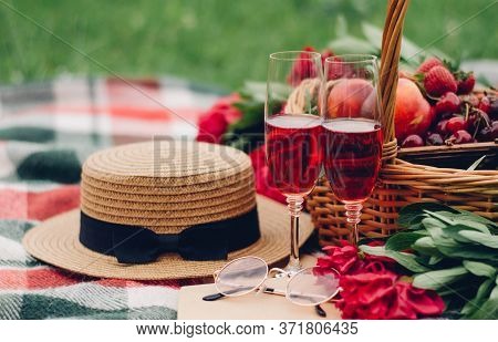 Mood Reading A Picnic Book Under A Glass Of Red Wine