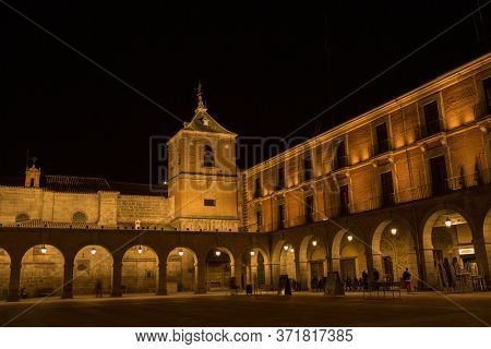 AVILA, SPAIN - April 26, 2019: Avila Town Hall square at night, called Mercado Chico. World Heritage site by UNESCO. Avila, Spain