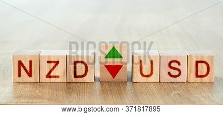 Nzd Usd Concept. Wooden Blocks With The Names Of Trading Instruments In The Foreign Exchange Market
